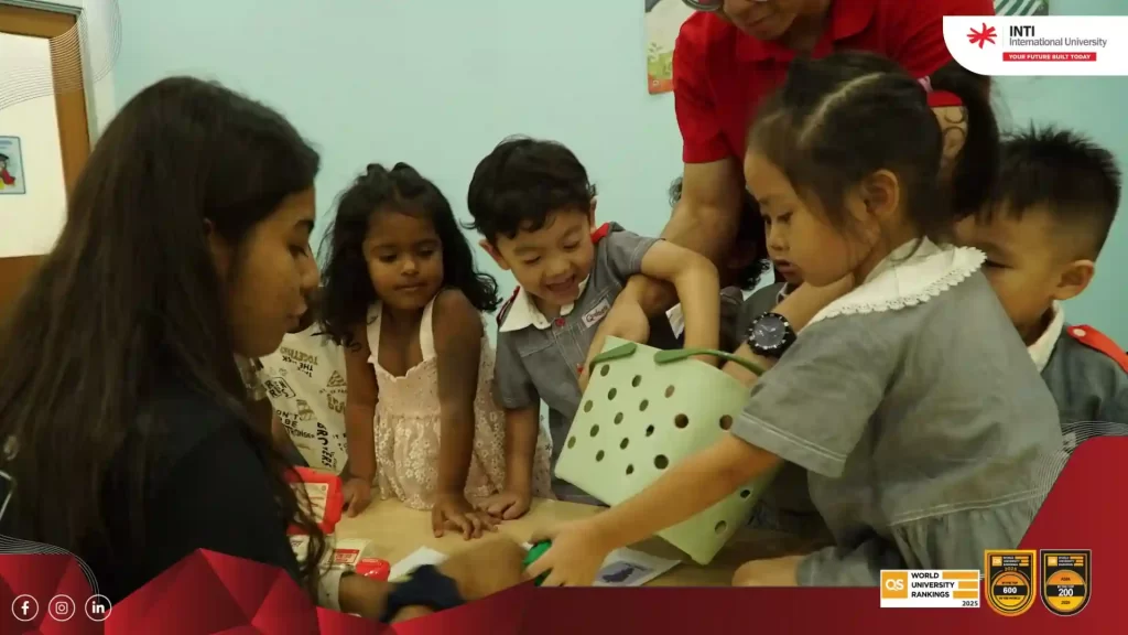 At Q-dees Eco Majestic B, INTI student volunteers introduced play shopping as an interactive learning activity.