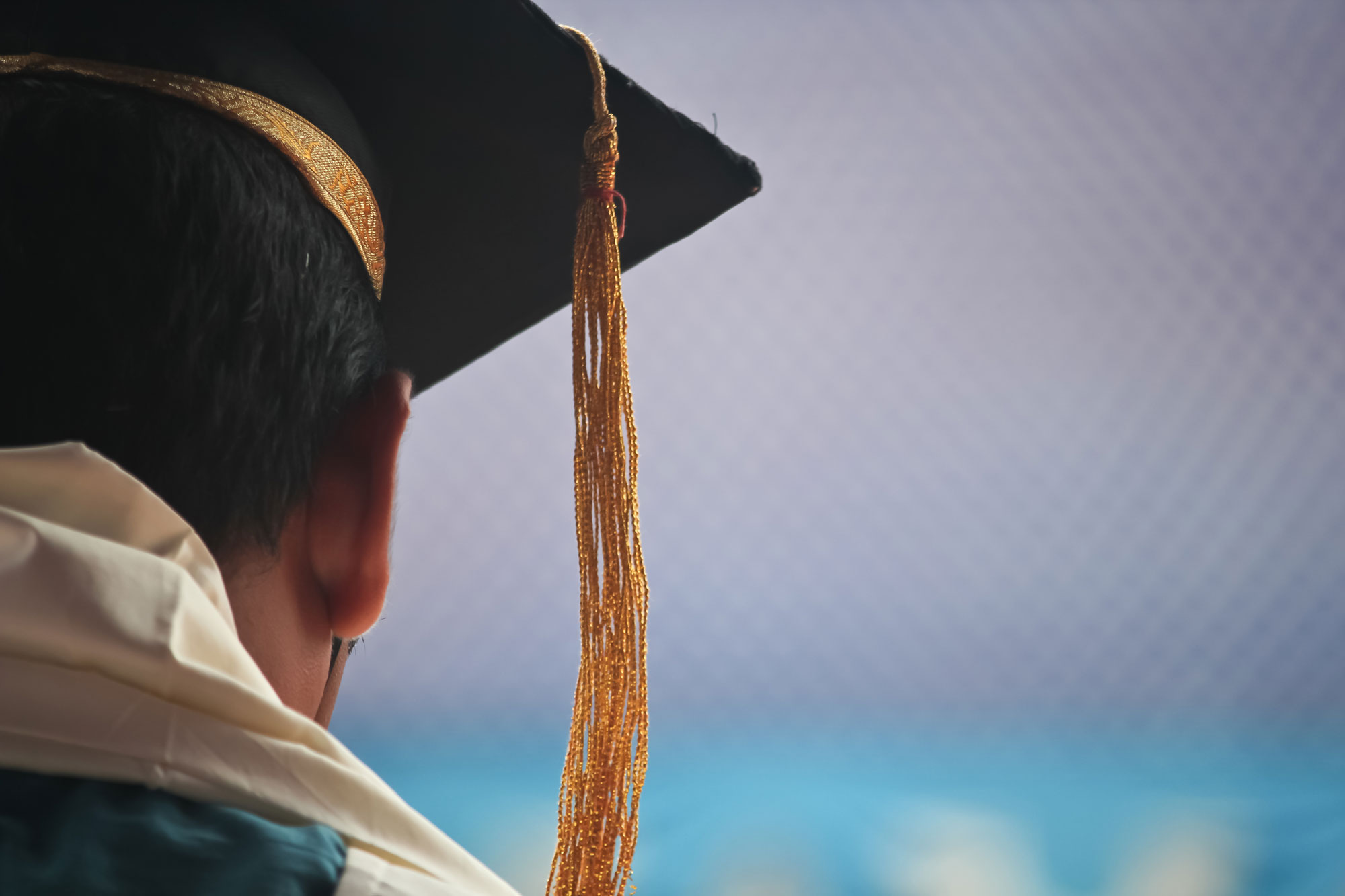 Man in his postgraduation cap and robe 